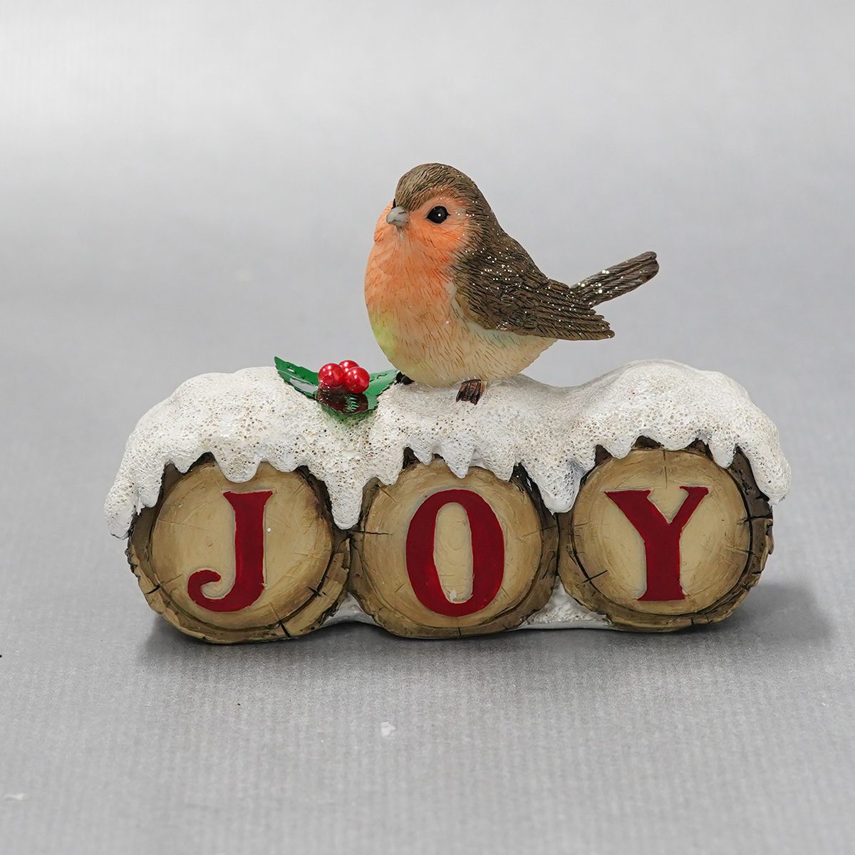 Standún Christmas Shop | Christmas robin sitting on snow covered logs