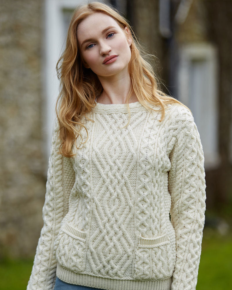 cable crew neck aran sweater with pockets