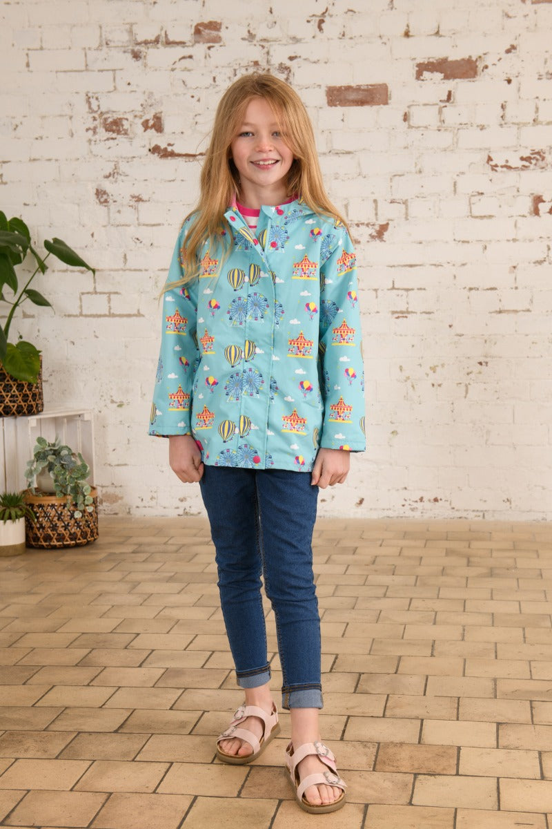 Lighthouse | Olivia Waterproof Coat | Blue Carnival Print