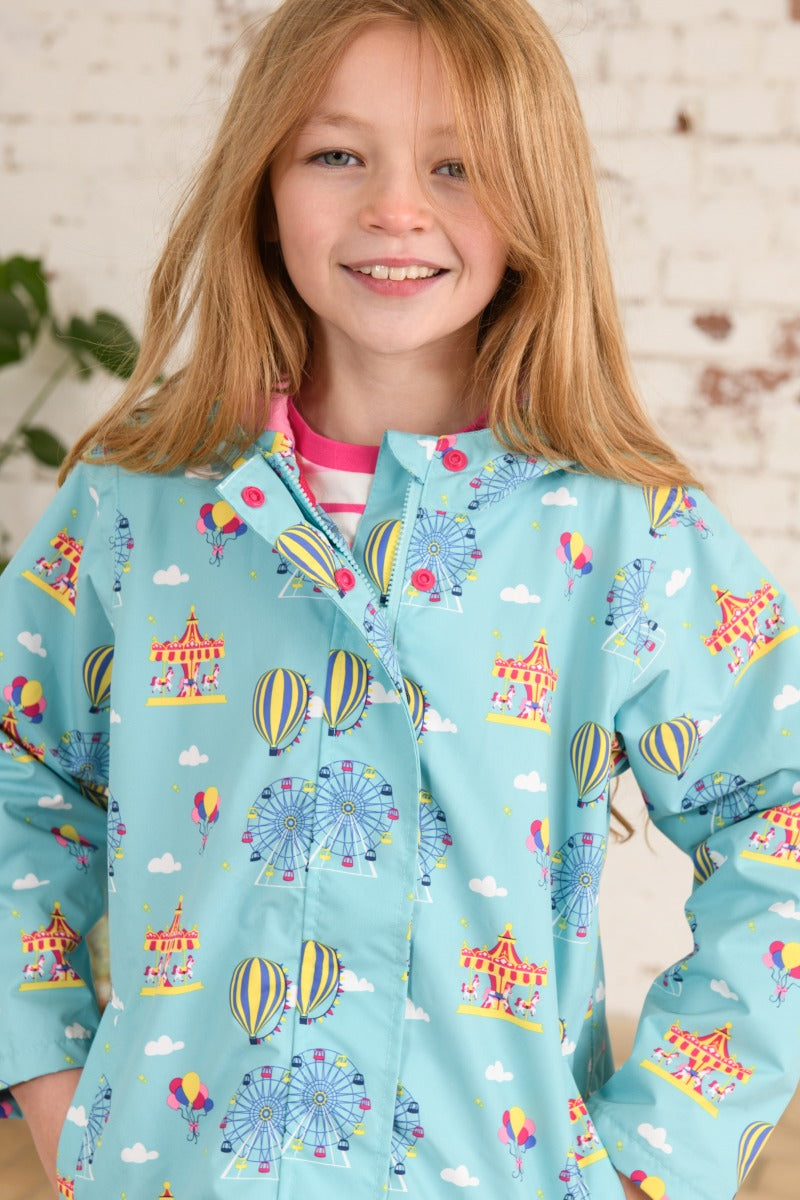 Lighthouse | Olivia Waterproof Coat | Blue Carnival Print