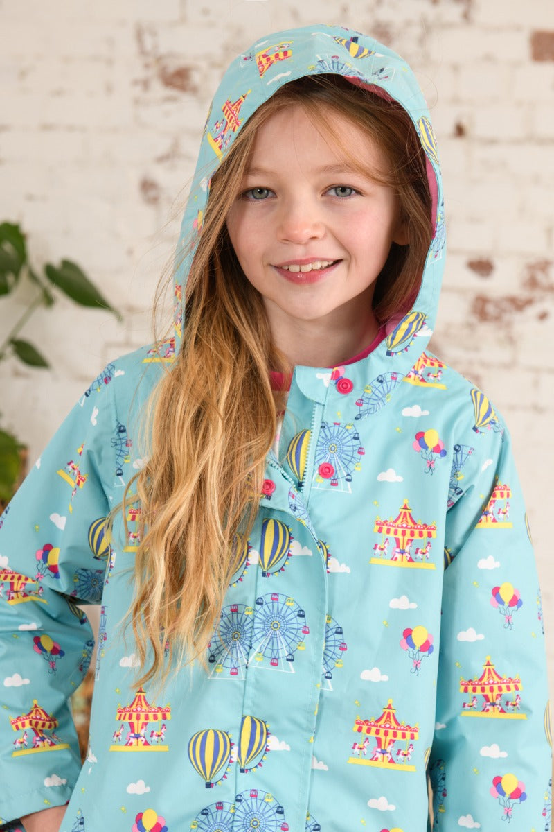 Lighthouse | Olivia Waterproof Coat | Blue Carnival Print