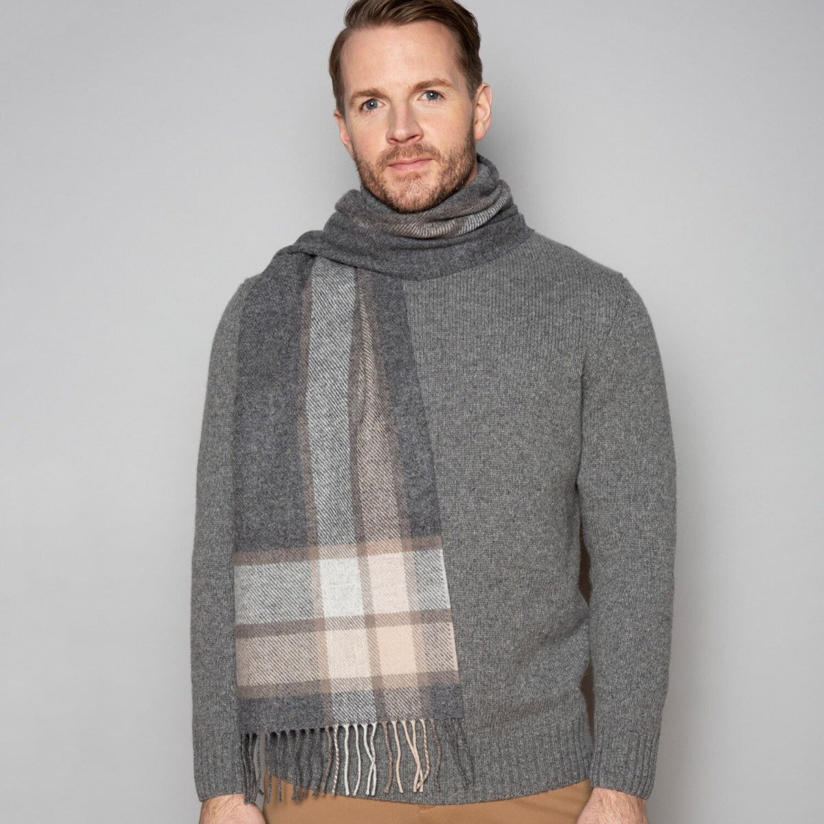 Model wearing Foxford Woollen Mills herringbone grey lambswool scarf