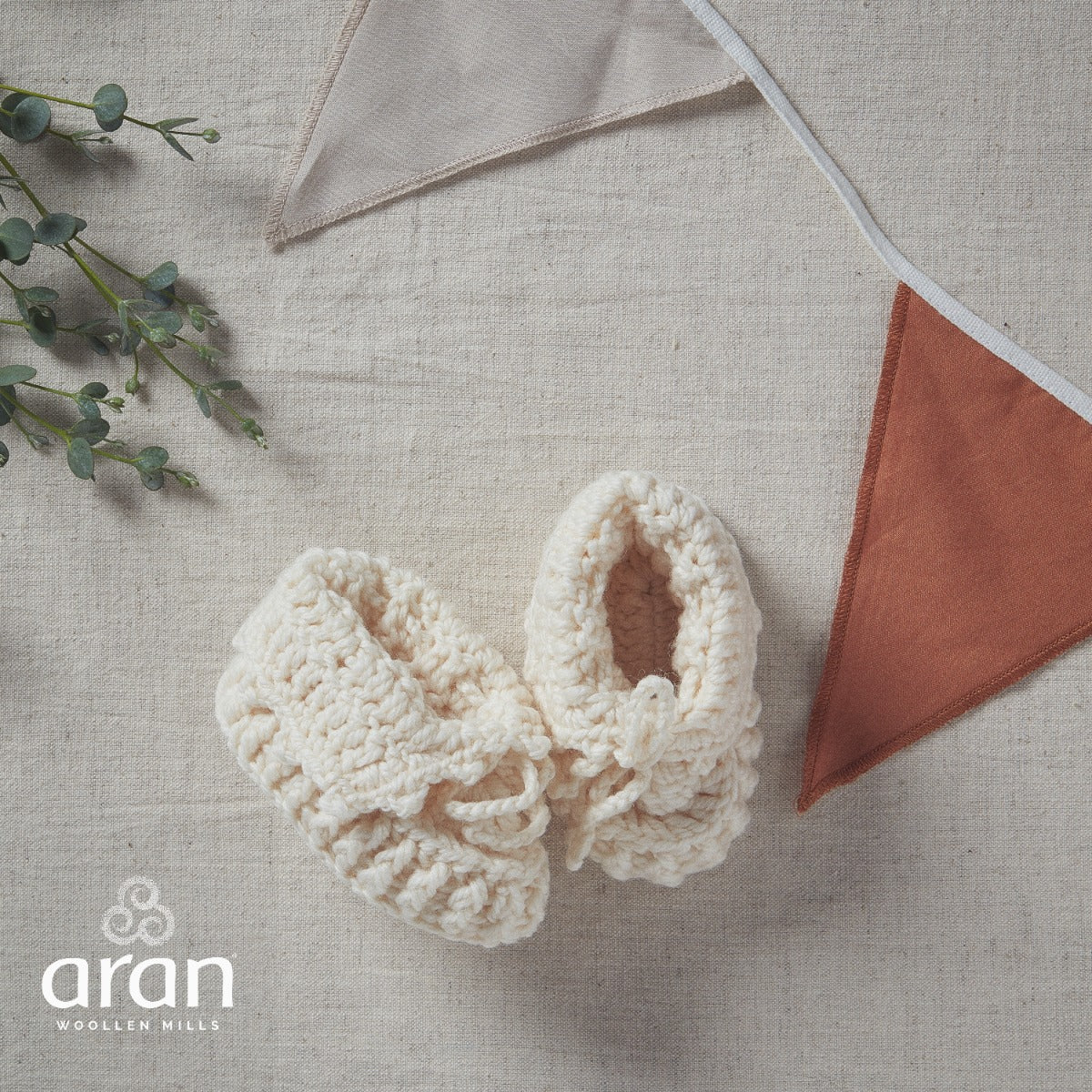 Aran Woollen Mills | Handknit Baby Slippers With Bow | R494 - Natural