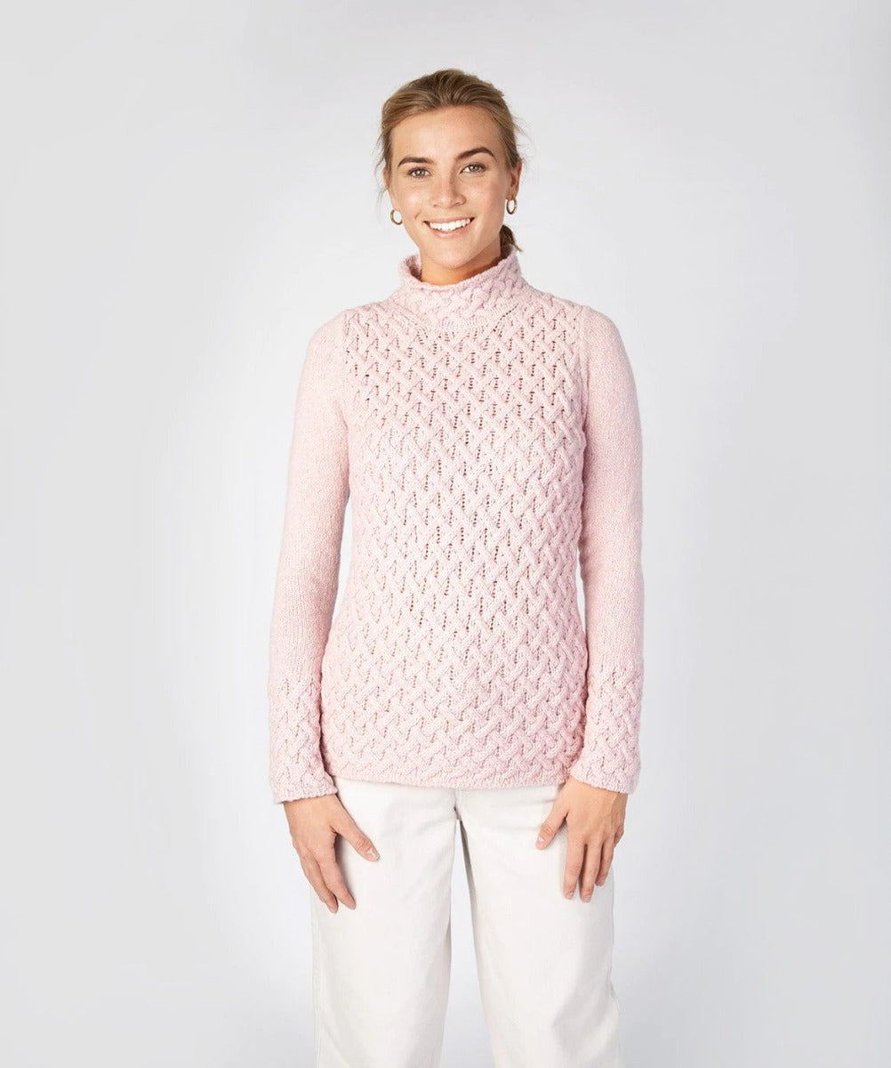 Model wearing Irelands Eye wool/cashmere sweater in pink