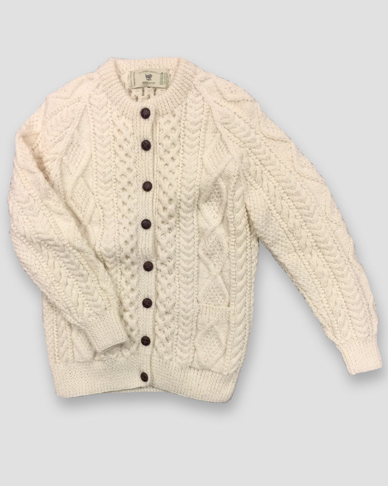 Front image of a traditional Aran sweater made from 100% Irish wool